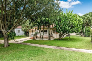 If you're seeking charm, a spacious backyard, and a prime on Miami Shores Country Club in Florida - for sale on GolfHomes.com, golf home, golf lot