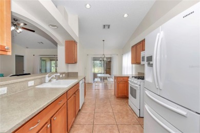 Nestled in an active 55+ community, this 3-bedroom, 2-bath home on Summerglen Country Club in Florida - for sale on GolfHomes.com, golf home, golf lot