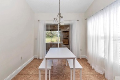 Nestled in an active 55+ community, this 3-bedroom, 2-bath home on Summerglen Country Club in Florida - for sale on GolfHomes.com, golf home, golf lot