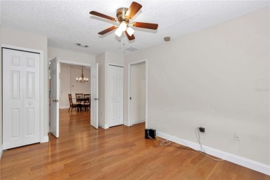 Nestled in an active 55+ community, this 3-bedroom, 2-bath home on Summerglen Country Club in Florida - for sale on GolfHomes.com, golf home, golf lot