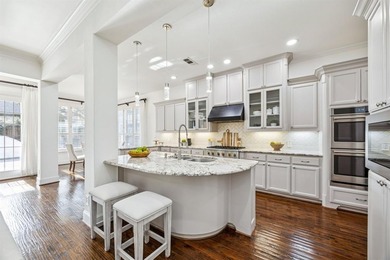 This stunning former Highland Homes model is perfectly on The Tribute At the Colony in Texas - for sale on GolfHomes.com, golf home, golf lot