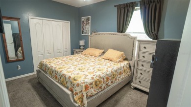 This stunning,  4-bedroom, 3-bathroom pool home boasts a light on Wedgefield Golf Club in Florida - for sale on GolfHomes.com, golf home, golf lot