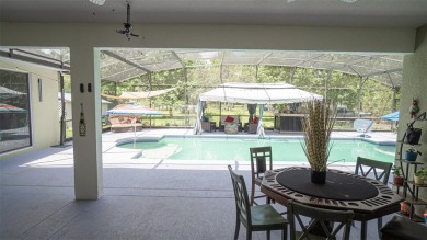 This stunning,  4-bedroom, 3-bathroom pool home boasts a light on Wedgefield Golf Club in Florida - for sale on GolfHomes.com, golf home, golf lot