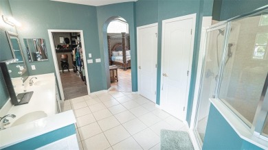 This stunning,  4-bedroom, 3-bathroom pool home boasts a light on Wedgefield Golf Club in Florida - for sale on GolfHomes.com, golf home, golf lot