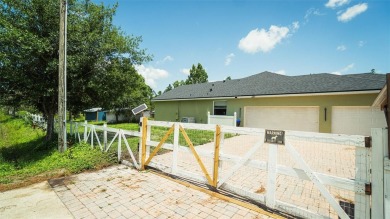 This stunning,  4-bedroom, 3-bathroom pool home boasts a light on Wedgefield Golf Club in Florida - for sale on GolfHomes.com, golf home, golf lot
