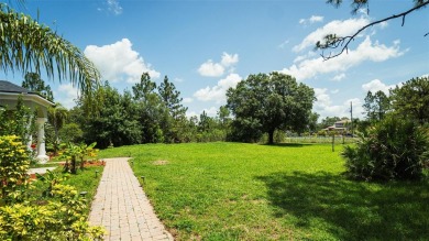 This stunning,  4-bedroom, 3-bathroom pool home boasts a light on Wedgefield Golf Club in Florida - for sale on GolfHomes.com, golf home, golf lot