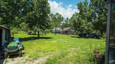 This stunning,  4-bedroom, 3-bathroom pool home boasts a light on Wedgefield Golf Club in Florida - for sale on GolfHomes.com, golf home, golf lot