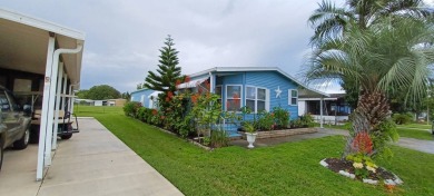 Come settle down and relax in a beautiful manufactured home with on Fairways Country Club in Florida - for sale on GolfHomes.com, golf home, golf lot