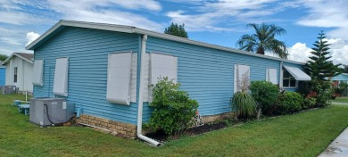 Come settle down and relax in a beautiful manufactured home with on Fairways Country Club in Florida - for sale on GolfHomes.com, golf home, golf lot