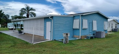 Come settle down and relax in a beautiful manufactured home with on Fairways Country Club in Florida - for sale on GolfHomes.com, golf home, golf lot