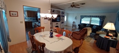 Come settle down and relax in a beautiful manufactured home with on Fairways Country Club in Florida - for sale on GolfHomes.com, golf home, golf lot