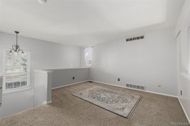 Updated and open 2 bedroom, 2 bath loft style townhome right on on Golf Club At Heather Ridge in Colorado - for sale on GolfHomes.com, golf home, golf lot