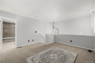 Updated and open 2 bedroom, 2 bath loft style townhome right on on Golf Club At Heather Ridge in Colorado - for sale on GolfHomes.com, golf home, golf lot