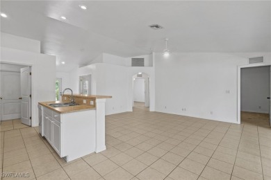 Located in NE Cape, this 3 bedroom, 2 bathroom home offers a on Del Tura Golf and Country Club in Florida - for sale on GolfHomes.com, golf home, golf lot