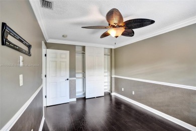 This true 5 BD | 2.5 BA gem has been remodeled with over $150k on The Links At Madison Green in Florida - for sale on GolfHomes.com, golf home, golf lot