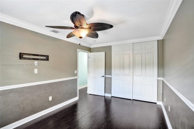 This true 5 BD | 2.5 BA gem has been remodeled with over $150k on The Links At Madison Green in Florida - for sale on GolfHomes.com, golf home, golf lot