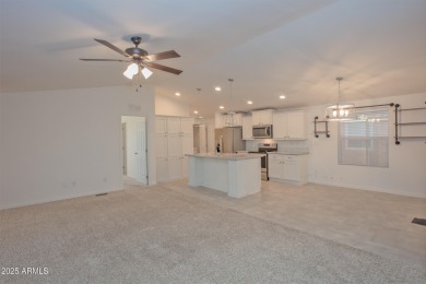 ON LEASED LAND:  Step into this nearly new 2022 Cavco on Sun City Riverview Golf Course in Arizona - for sale on GolfHomes.com, golf home, golf lot