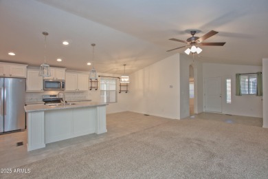 ON LEASED LAND:  Step into this nearly new 2022 Cavco on Sun City Riverview Golf Course in Arizona - for sale on GolfHomes.com, golf home, golf lot