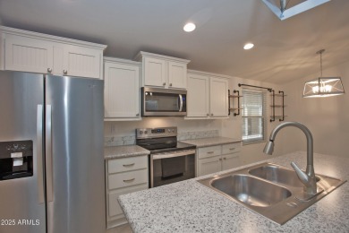 ON LEASED LAND:  Step into this nearly new 2022 Cavco on Sun City Riverview Golf Course in Arizona - for sale on GolfHomes.com, golf home, golf lot