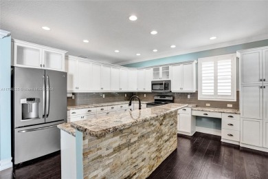 This true 5 BD | 2.5 BA gem has been remodeled with over $150k on The Links At Madison Green in Florida - for sale on GolfHomes.com, golf home, golf lot