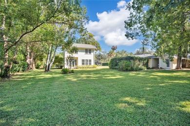 Step into a storybook cottage tucked in the heart of Windermere on Isleworth Golf and Country Club in Florida - for sale on GolfHomes.com, golf home, golf lot