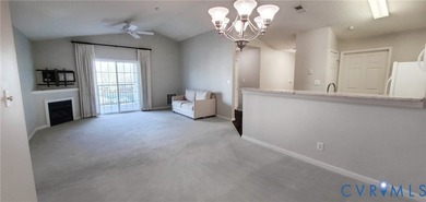 Welcome to 701 Masters Row, an exceptional third-floor corner on The Tradition Golf Club At The Crossings in Virginia - for sale on GolfHomes.com, golf home, golf lot