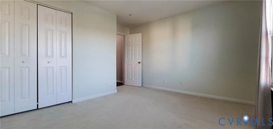 Welcome to 701 Masters Row, an exceptional third-floor corner on The Tradition Golf Club At The Crossings in Virginia - for sale on GolfHomes.com, golf home, golf lot