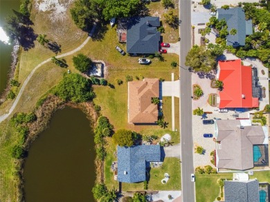 Absolutely stunning three-bedroom, two-bath, PLUS OFFICE on Apollo Beach Golf and Sea Club in Florida - for sale on GolfHomes.com, golf home, golf lot