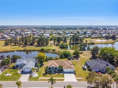 Absolutely stunning three-bedroom, two-bath, PLUS OFFICE on Apollo Beach Golf and Sea Club in Florida - for sale on GolfHomes.com, golf home, golf lot