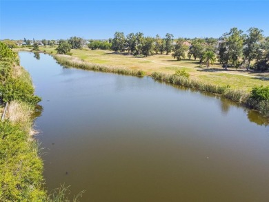 Absolutely stunning three-bedroom, two-bath, PLUS OFFICE on Apollo Beach Golf and Sea Club in Florida - for sale on GolfHomes.com, golf home, golf lot