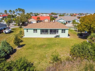 Absolutely stunning three-bedroom, two-bath, PLUS OFFICE on Apollo Beach Golf and Sea Club in Florida - for sale on GolfHomes.com, golf home, golf lot