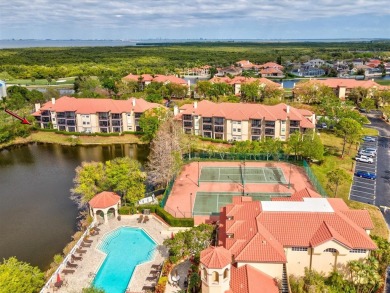 Seize the opportunity to own a piece of resort-style living in on Feather Sound Country Club in Florida - for sale on GolfHomes.com, golf home, golf lot