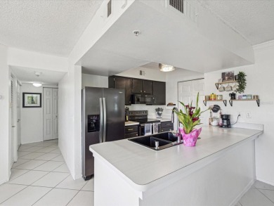 Seize the opportunity to own a piece of resort-style living in on Feather Sound Country Club in Florida - for sale on GolfHomes.com, golf home, golf lot