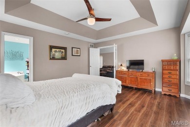 This beautifully designed atrium ranch offers the perfect blend on Bear Creek Golf Club in Missouri - for sale on GolfHomes.com, golf home, golf lot