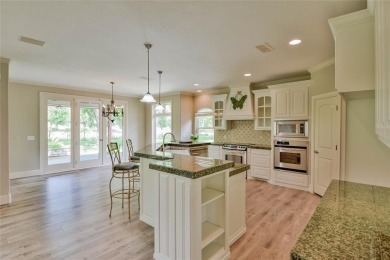 This exceptional residence in Pecan Plantation, is a stone and on Pecan Plantation Country Club in Texas - for sale on GolfHomes.com, golf home, golf lot