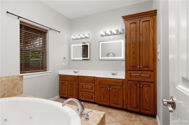 HOME NEVER FLOODED!!! 
Experience serene pond-side living in on Harlingen Country Club in Texas - for sale on GolfHomes.com, golf home, golf lot