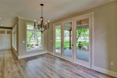 This exceptional residence in Pecan Plantation, is a stone and on Pecan Plantation Country Club in Texas - for sale on GolfHomes.com, golf home, golf lot
