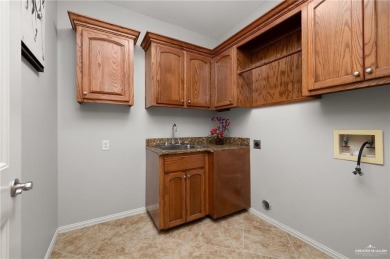 HOME NEVER FLOODED!!! 
Experience serene pond-side living in on Harlingen Country Club in Texas - for sale on GolfHomes.com, golf home, golf lot