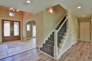This exceptional residence in Pecan Plantation, is a stone and on Pecan Plantation Country Club in Texas - for sale on GolfHomes.com, golf home, golf lot