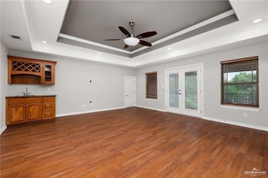 HOME NEVER FLOODED!!! 
Experience serene pond-side living in on Harlingen Country Club in Texas - for sale on GolfHomes.com, golf home, golf lot