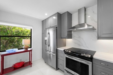Welcome to this beautifully updated second-floor residence on Quail Ridge Golf Course and Country Club in Florida - for sale on GolfHomes.com, golf home, golf lot