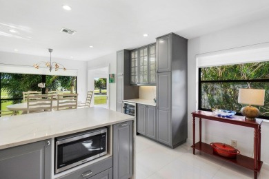 Welcome to this beautifully updated second-floor residence on Quail Ridge Golf Course and Country Club in Florida - for sale on GolfHomes.com, golf home, golf lot