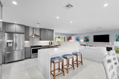 Welcome to this beautifully updated second-floor residence on Quail Ridge Golf Course and Country Club in Florida - for sale on GolfHomes.com, golf home, golf lot