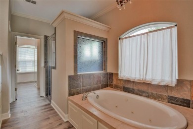This exceptional residence in Pecan Plantation, is a stone and on Pecan Plantation Country Club in Texas - for sale on GolfHomes.com, golf home, golf lot