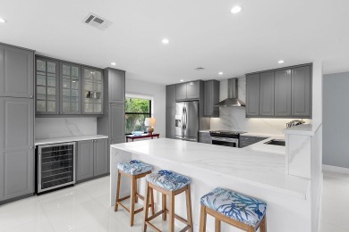Welcome to this beautifully updated second-floor residence on Quail Ridge Golf Course and Country Club in Florida - for sale on GolfHomes.com, golf home, golf lot