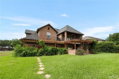 HOME NEVER FLOODED!!! 
Experience serene pond-side living in on Harlingen Country Club in Texas - for sale on GolfHomes.com, golf home, golf lot