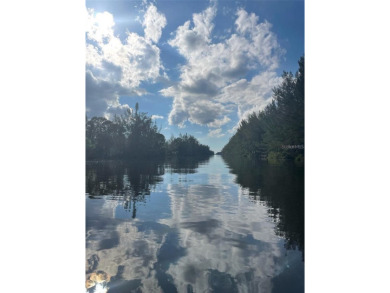 Water front Lot. Great opportunity to buy and build or invest on Rotonda Golf and Country Club The Links Course in Florida - for sale on GolfHomes.com, golf home, golf lot