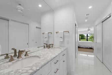 Welcome to this beautifully updated second-floor residence on Quail Ridge Golf Course and Country Club in Florida - for sale on GolfHomes.com, golf home, golf lot