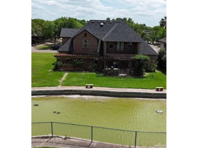 HOME NEVER FLOODED!!! 
Experience serene pond-side living in on Harlingen Country Club in Texas - for sale on GolfHomes.com, golf home, golf lot