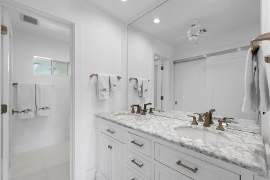 Welcome to this beautifully updated second-floor residence on Quail Ridge Golf Course and Country Club in Florida - for sale on GolfHomes.com, golf home, golf lot